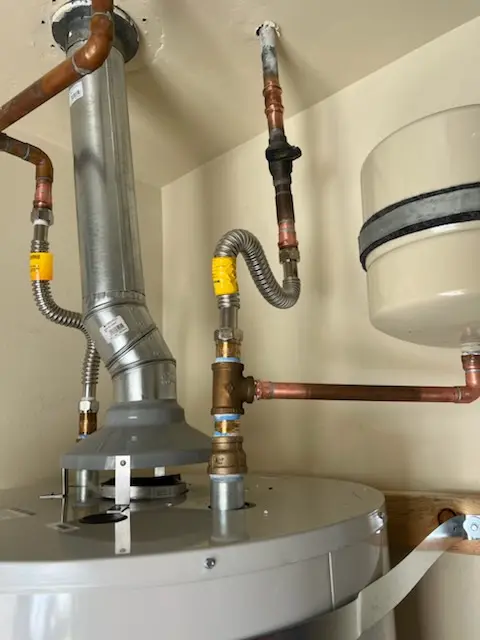 Water heater installation and plumbing repair in The Village